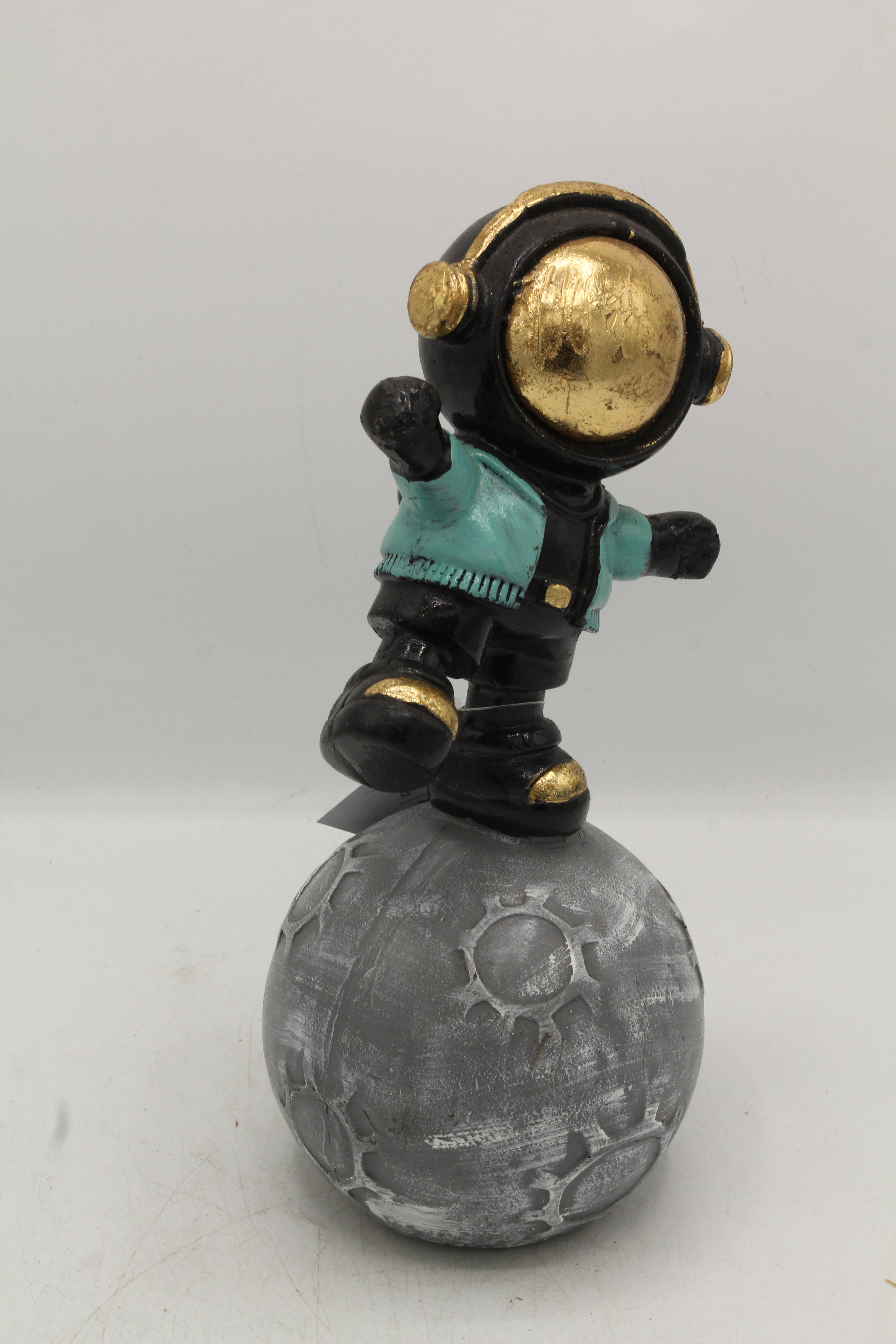 Cosmic Gold Astronaut on Moon Sculpture